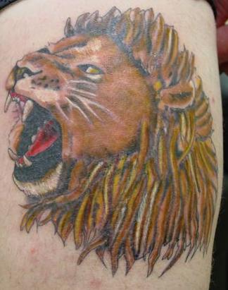 colored tattoos. lion head tattoos